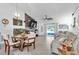 Cozy living room and dining area with sliding glass doors at 5106 Tanner Rd, Spring Hill, FL 34609