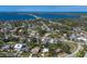 Stunning aerial view of a charming neighborhood near a beautiful blue ocean at 610 Casabella Dr, Bradenton, FL 34209