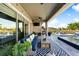 Covered patio featuring an outdoor living area with comfortable seating, a pool view, and a relaxing atmosphere at 6326 Brevada Ln, Apollo Beach, FL 33572