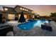 Enjoy your evenings in your backyard with custom pool, spa, and outdoor kitchen at 6326 Brevada Ln, Apollo Beach, FL 33572