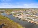 Aerial view of waterfront homes with private docks at 6518 Leeside Isle, Hudson, FL 34667