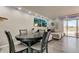 Open concept living room and dining area is bright and airy at 7432 Sunshine Skyway S Ln # 206, St Petersburg, FL 33711