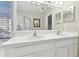 Bathroom featuring a double-sink vanity, large mirror, soaking tub and a separate shower at 7945 Carriage Pointe Dr, Gibsonton, FL 33534