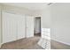 Neutral bedroom features double door closet and carpet floors at 7945 Carriage Pointe Dr, Gibsonton, FL 33534