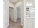 Hallway view of bathroom and bedrooms at 7945 Carriage Pointe Dr, Gibsonton, FL 33534