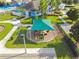 Community playground with shade cover near the clubhouse at 7945 Carriage Pointe Dr, Gibsonton, FL 33534