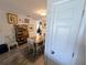 View of dining room featuring hardwood floors and vintage furniture and decor at 8445 Jeffrey N # 8445, Pinellas Park, FL 33781