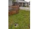 Backyard featuring wood deck, fence, and grass at 910 Seminole St, Clearwater, FL 33755