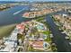 Expansive aerial view of waterfront homes, canals, and boats in a beautiful coastal community at 912 Symphony Beach Ln, Apollo Beach, FL 33572