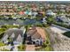 Well-manicured waterfront home with quick bay access and a three-car garage at 912 Symphony Beach Ln, Apollo Beach, FL 33572