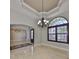 Dining room with marble floors, custom window with shutters, and elegant chandelier at 912 Symphony Beach Ln, Apollo Beach, FL 33572