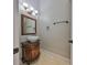 Powder room with pedestal sink and decorative lighting at 912 Symphony Beach Ln, Apollo Beach, FL 33572