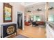 Inviting living room with hardwood floors, bright natural light, and stylish furniture at 9321 Regatta Cir, Spring Hill, FL 34606