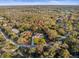 A dramatic aerial view shows the boundary lines of the home's property at 1011 Riverside Ridge Rd, Tarpon Springs, FL 34688
