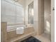Relaxing bathtub with tile surround, and natural light at 1011 Riverside Ridge Rd, Tarpon Springs, FL 34688