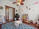 Spacious playroom with hardwood floors and large windows provides an ideal space for activities at 1011 Riverside Ridge Rd, Tarpon Springs, FL 34688