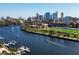 Beautiful aerial view of the Hillsborough River with the Tampa skyline, boats, and docks on a sunny day at 1011 W Columbus Dr, Tampa, FL 33602