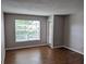 Bright, open bedroom features a large window and a private balcony, perfect for relaxing at 10200 Gandy N Blvd # 209, St Petersburg, FL 33702