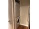 Efficient laundry area with stacked washer and dryer unit, perfect for space-saving convenience at 10200 Gandy N Blvd # 209, St Petersburg, FL 33702