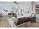 Stylish living room with modern furniture, decorative accents, and plenty of natural light at 12339 Hearts Ease St, Venice, FL 34293