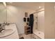 Bright bathroom featuring double sinks, a walk-in shower, and stylish fixtures at 1274 Ocean Spray Dr, Ruskin, FL 33570