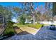 A landscaped backyard offers a serene retreat, perfect for enjoying the outdoors and relaxation at 13255 Don Loop, Spring Hill, FL 34609