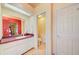Bathroom featuring a vanity with white cabinets and a door leading to the toilet at 13255 Don Loop, Spring Hill, FL 34609