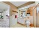 Neutral bathroom with tile floors, a vanity, and a glass-enclosed shower at 13255 Don Loop, Spring Hill, FL 34609