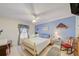 Cozy bedroom featuring white furniture, blue accents, and a ceiling fan; creates a relaxing space at 13255 Don Loop, Spring Hill, FL 34609