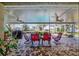 Screened-in patio with brick floors and comfortable seating at 13255 Don Loop, Spring Hill, FL 34609