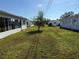 Spacious backyard showcasing lush greenery and mature trees at 14132 89Th Ave, Seminole, FL 33776