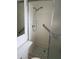 Small bathroom featuring a shower with a sliding glass door at 14132 89Th Ave, Seminole, FL 33776