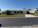 Charming single-story home featuring a well-manicured lawn and inviting curb appeal at 14132 89Th Ave, Seminole, FL 33776