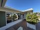 Welcoming front entry featuring a brick walkway and decorative greenery at 14132 89Th Ave, Seminole, FL 33776