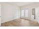 Bedroom featuring wood-look flooring and closet at 14329 14Th St, Dade City, FL 33523