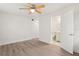 Bedroom with attached bathroom and hardwood flooring at 14329 14Th St, Dade City, FL 33523
