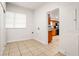 Mud room area leading into the kitchen at 14329 14Th St, Dade City, FL 33523