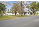 Charming home with fenced yard along a quiet street at 14329 14Th St, Dade City, FL 33523