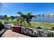 Enjoy the lake view from your patio with a paddle board ready for adventure at 151 Sea Horse Se Dr # D, St Petersburg, FL 33705