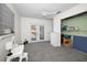 Bedroom with a vanity and glass doors leading to the backyard pool at 2580 Redwood Way, Clearwater, FL 33761
