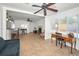 Bright open floor plan with eat-in kitchen, fireplace, and sun room with backyard views at 2580 Redwood Way, Clearwater, FL 33761