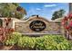 Community entrance sign reading 'Crosby Crossings' set amongst lush landscaping at 305 Taxter Run Ln, Valrico, FL 33594