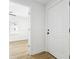 Bright entryway featuring hardwood floors with views of a bedroom and front yard at 38638 2Nd Ave, Zephyrhills, FL 33542