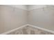 Walk-in closet featuring wire shelving and plush carpet at 4549 Chinkapin Dr, Sarasota, FL 34232
