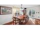 Dining room area with hardwood floors, bright natural light, and sliding doors to the outside at 5036 18Th N St, St Petersburg, FL 33714