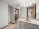 Bathroom featuring a vanity, a walk-in shower and built-in closets at 5443 Ott Ct, Spring Hill, FL 34608
