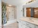 Bathroom with a vanity sink and a tub with shower at 5443 Ott Ct, Spring Hill, FL 34608