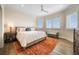 Cozy bedroom with a neutral color scheme, comfortable bed, and natural lighting at 555 5Th Ne Ave # 1243, St Petersburg, FL 33701