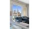 Cozy living room area features an open view of the city skyline and harbor at 555 5Th Ne Ave # 1243, St Petersburg, FL 33701