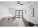 Bright living room features modern decor, contemporary lighting, and a stylish entry door at 6213 64Th N Way, Pinellas Park, FL 33781